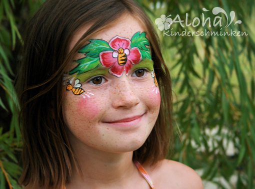 Bee face art with yellow and black stripes