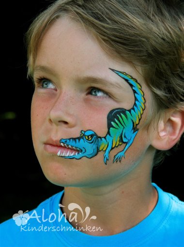 Dinosaur face paint design for children at family events