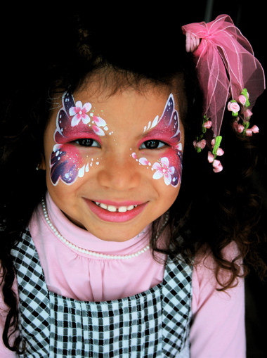 Colourful carnival face painting for children in Bavaria