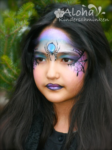 Witch face painting with fine details for Halloween