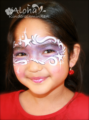 Witch face art for children with playful character