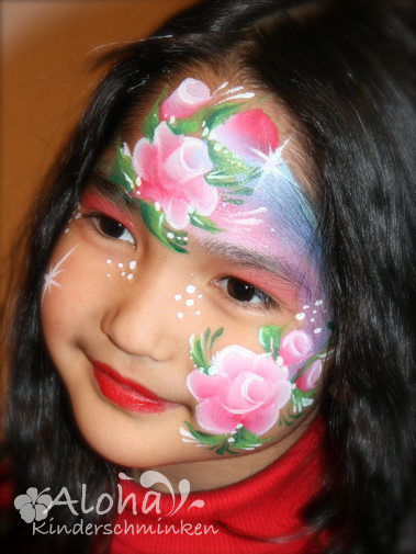 Rose face paint design with rich colors