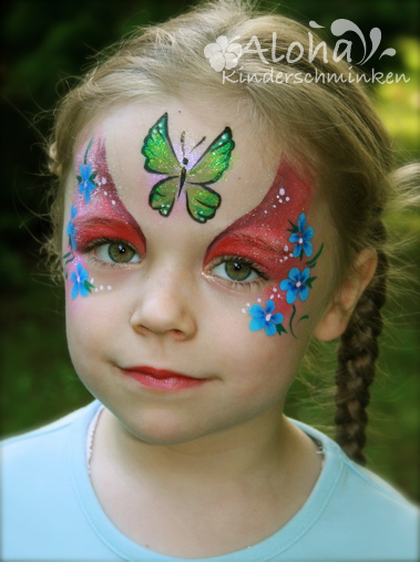 Butterfly face painting art with colourful details