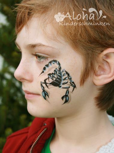 Scorpion face paint design for children with striking details